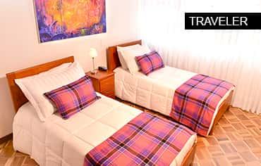 Habitación con dos camas sencillas